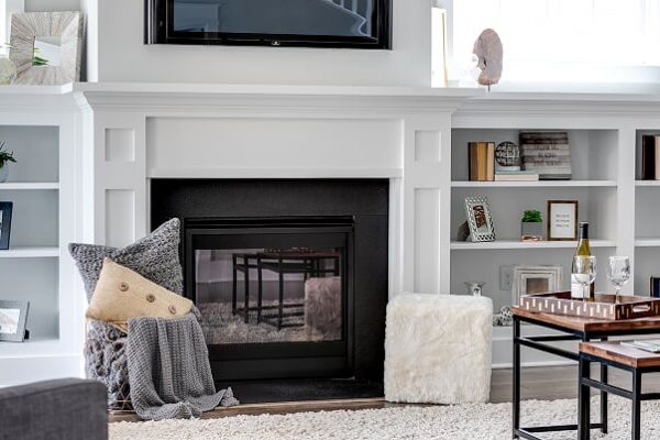 Fireplace and built in shelving in home built by Richmond Hill Design-Build