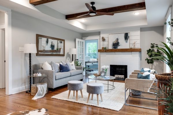 Family room with wooden beams in open concept floor plan by Richmond Hill Design-Build