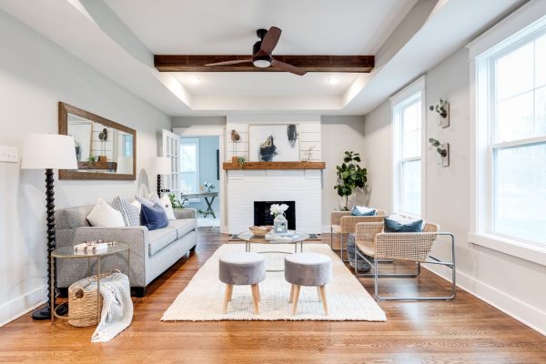 Family room with wooden beams in open concept floor plan by Richmond Hill Design-Build