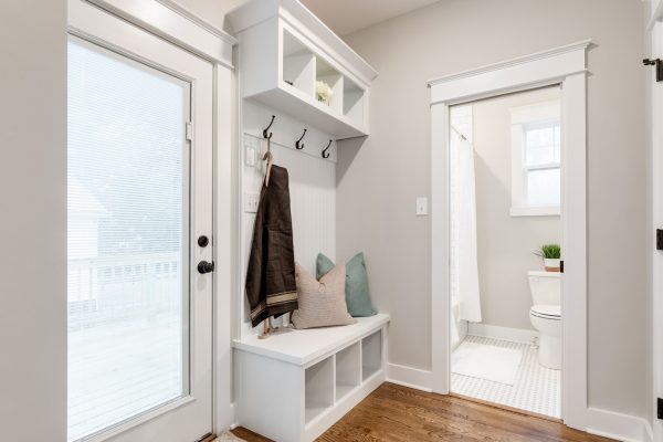 Mudroom with built in shelving in home built by Richmond Hill Design-Build