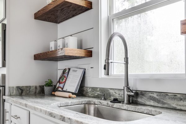 Kitchen with floating shelves in home built by Richmond Hill Design-Build