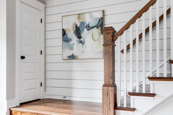 Entryway with shiplap in new home built by Richmond Hill Design-Build