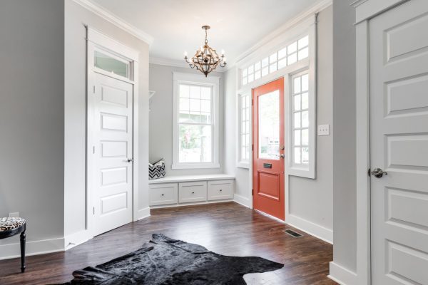 Beautiful foyer with bench seat and ample windows