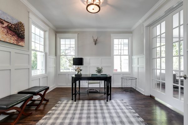 Home office in renovated home with open floor plan built by Richmond Hill Design-Build