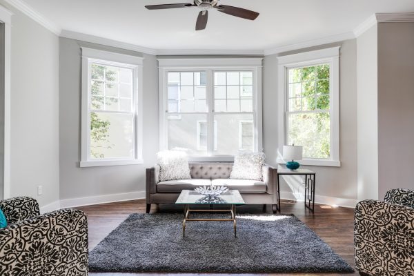 Bright and airy sitting room in renovated home built by Richmond Hill Design-Build