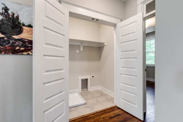 Laundry room in home built by Richmond Hill Design-Build