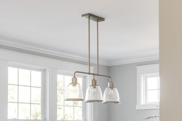 Pendant chandelier in dining room in home built by Richmond Hill Design-Build