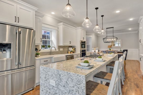 Waterfall granite Island in beautiful kitchen by Richmond Hill Design-Build