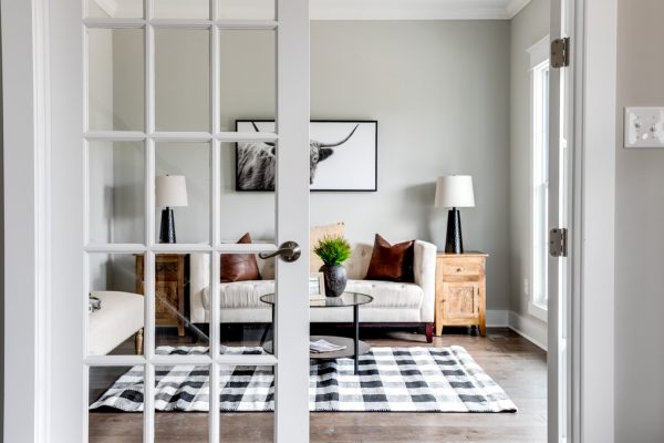 Sitting room with French doors in new home built by Richmond Hill Design-Build