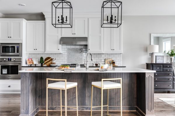 Kitchen with island and pendant lights in new home built by Richmond Hill Design-Build