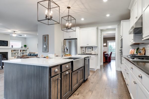 Kitchen with island and pendant lights in new home built by Richmond Hill Design-Build