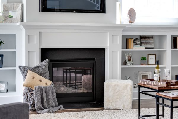 Family room with fireplace in new home built by Richmond Hill Design-Build