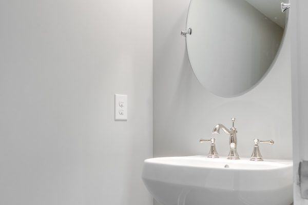 Powder room in new home by Richmond Hill Design-Build