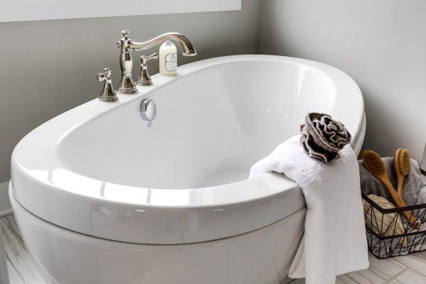 Freestanding tub in bathroom in new home by Richmond Hill Design-Build