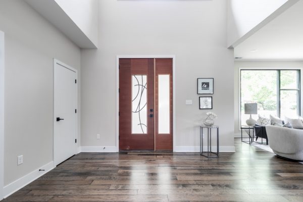 Beautiful double front doors in new contemporary home by Richmond Hill Design-Build