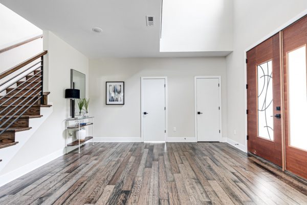 Beautiful double front doors in new contemporary home by Richmond Hill Design-Build