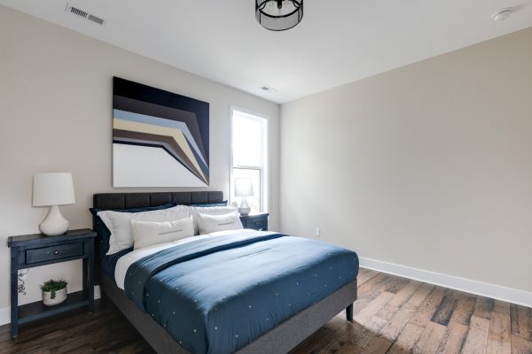 Guest bedroom in new contemporary home by Richmond Hill Design-Build