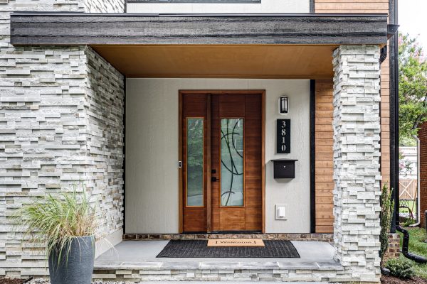 Stunning front entryway of new contemporary home by Richmond Hill Design-Build