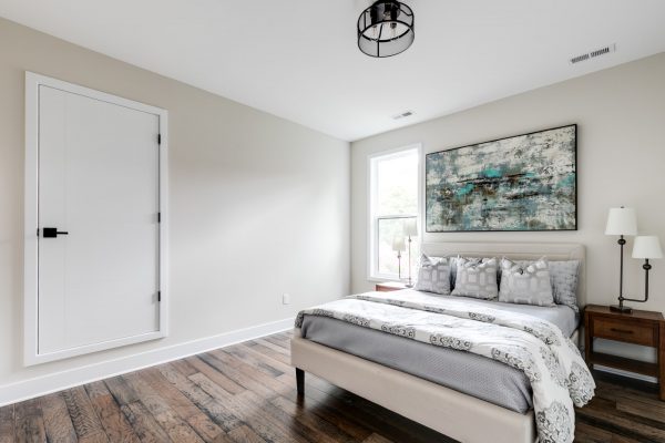 Guest bedroom in new contemporary home by Richmond Hill Design-Build