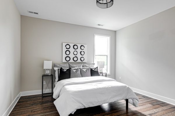 Guest bedroom in new contemporary home by Richmond Hill Design-Build