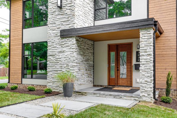 Stunning front entryway of new contemporary home by Richmond Hill Design-Build