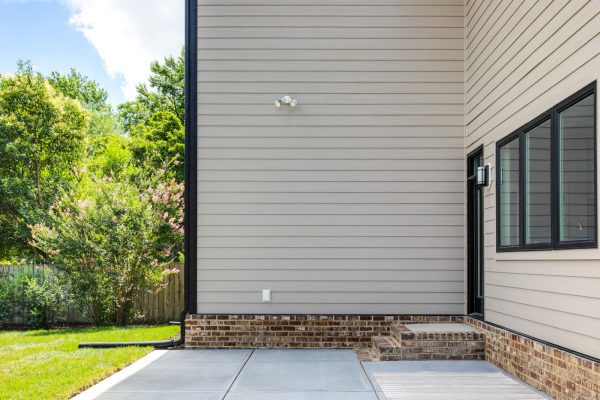 Rear patio of new contemporary home by Richmond Hill Design-Build