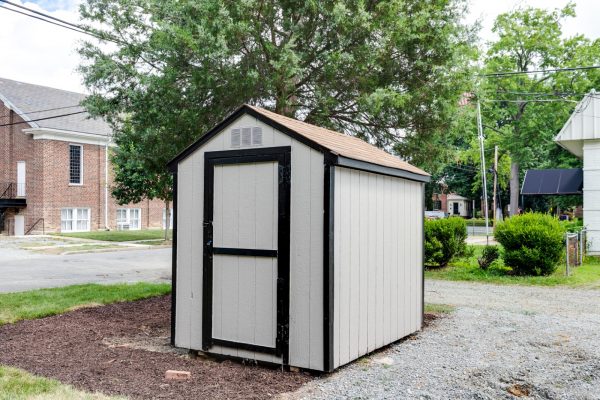 Storage shed in rear yard of new contemporary home by Richmond Hill Design-Build