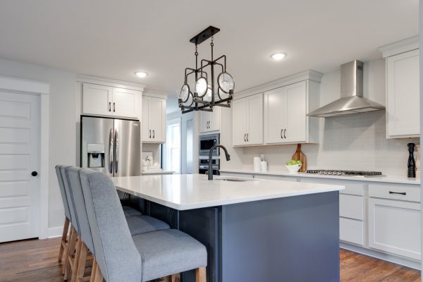 Kitchen island in renovation of Dutch Colonial home by Richmond Hill Design-Build