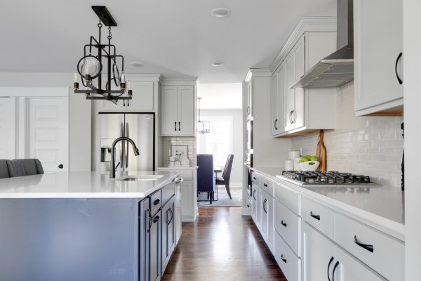 Two-toned cabinetry in kitchen of renovated home by Richmond Hill Design-Build