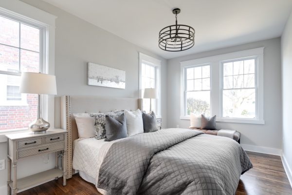 Guest bedroom in renovated Dutch Colonial home by Richmond Hill Design-Build