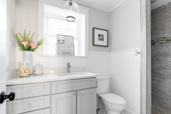 Guest bathroom in renovated Dutch Colonial home by Richmond Hill Design-Build