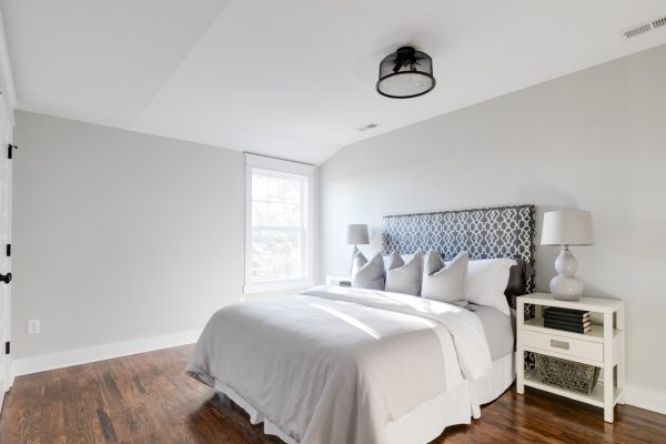 Guest bedroom in renovated Dutch Colonial home by Richmond Hill Design-Build