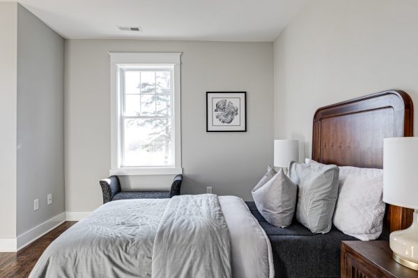 Guest bedroom in renovated Dutch Colonial home by Richmond Hill Design-Build