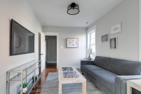 Sitting area/study in renovated Dutch Colonial home by Richmond Hill Design-Build