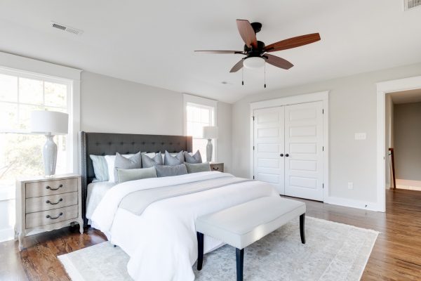 Owner's bedroom in renovated Dutch Colonial home by Richmond Hill Design-Build