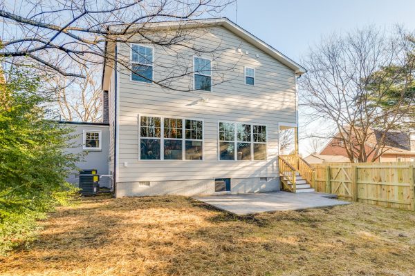 Rear elevation of renovated Dutch Colonial home by Richmond Hill Design-Build