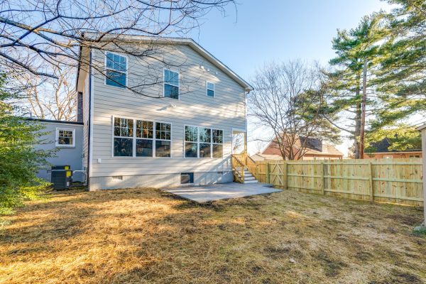 Rear elevation of renovated Dutch Colonial home by Richmond Hill Design-Build