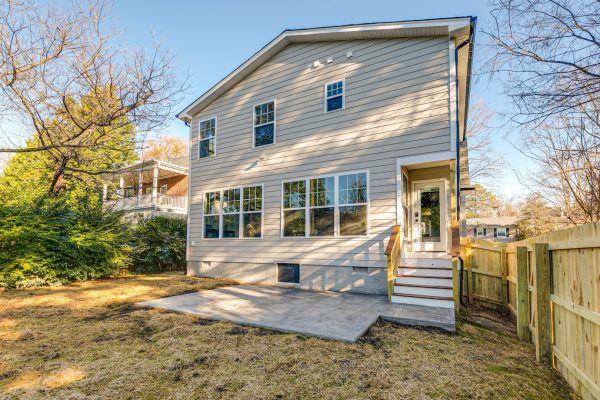 Rear elevation of renovated Dutch Colonial home by Richmond Hill Design-Build