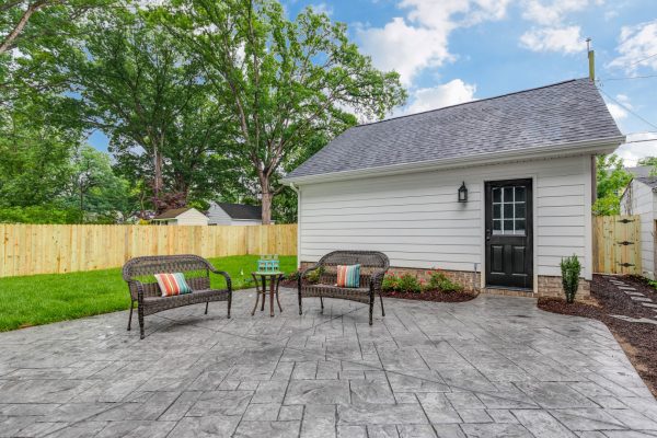 Stamped concrete patio in backyard of beautiful new home built by Richmond Hill Design-Build