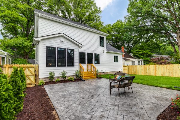 Stamped concrete patio in backyard of beautiful new home built by Richmond Hill Design-Build