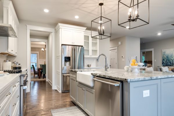 Kitchen with stainless steel appliances in home built by Richmond Hill Design-Build