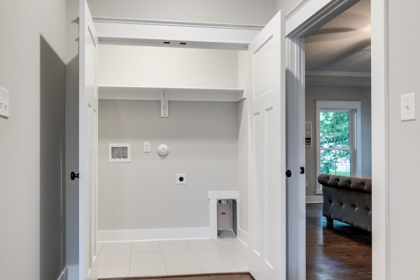 Laundry closet in home built by Richmond Hill Design-Build