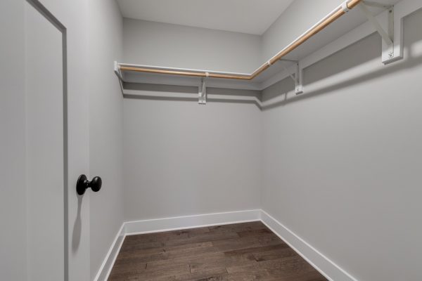 Owner's walk in closet in renovated home by Richmond Hill Design-Build