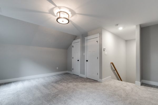 Guest bedroom in new home by Richmond Hill Design-Build