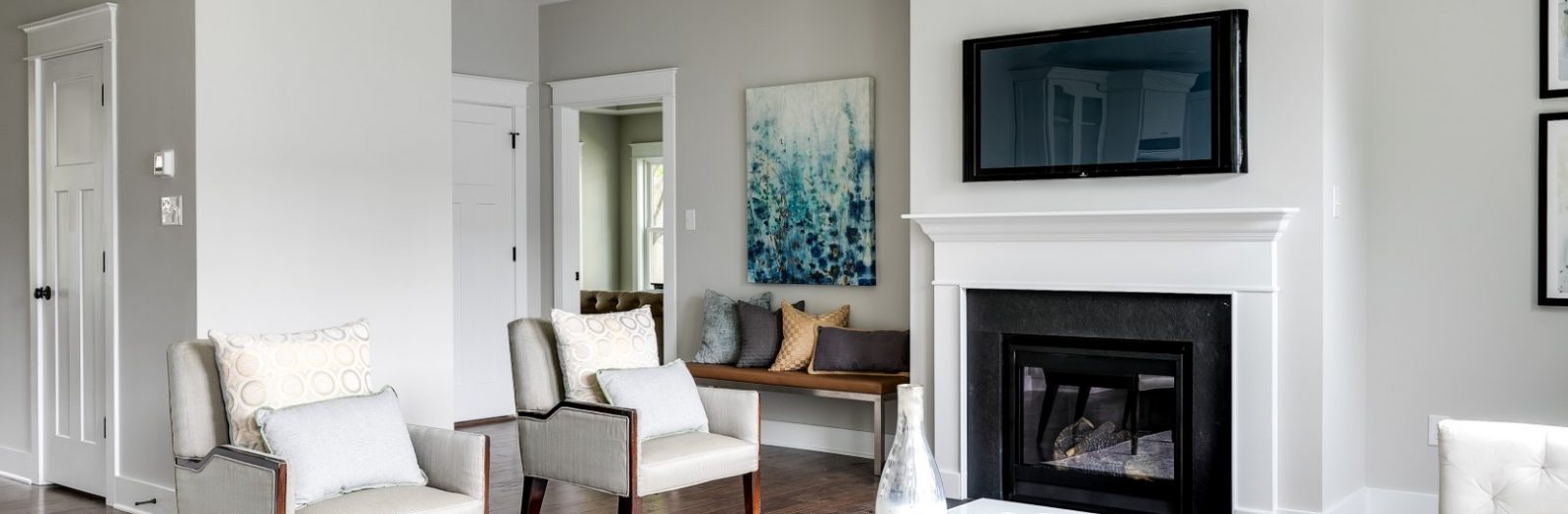 Family room with linear fireplace in home built by Richmond Hill Design-Build