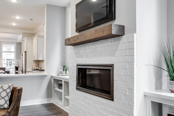 Fireplace in family room in townhouse by Richmond Hill Design-Build