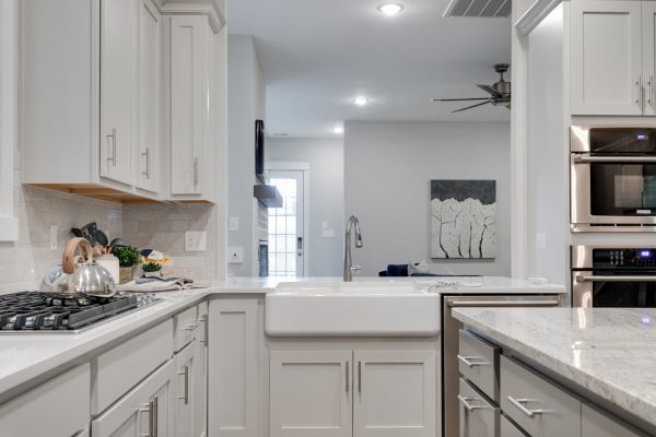 Farmhouse sink in kitchen of new townhouse by Richmond Hill Design-Build