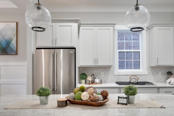 Stainless steel appliances in kitchen of new townhouse by Richmond Hill Design-Build