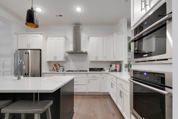 Beautiful island in kitchen of new townhouse by Richmond Hill Design-Build