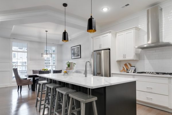 Beautiful island in kitchen of new townhouse by Richmond Hill Design-Build